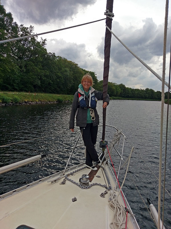 Deb on the bow, the view forward in the canal