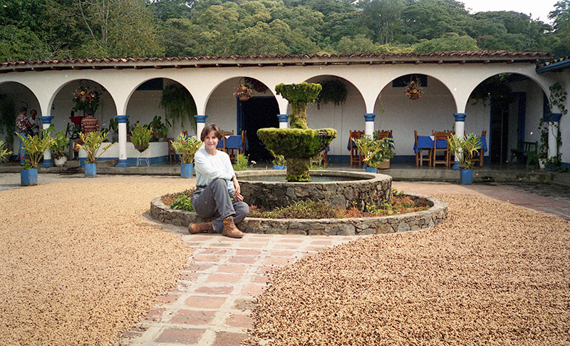 Deb posing at the central fountain in the central square of the hacienda.