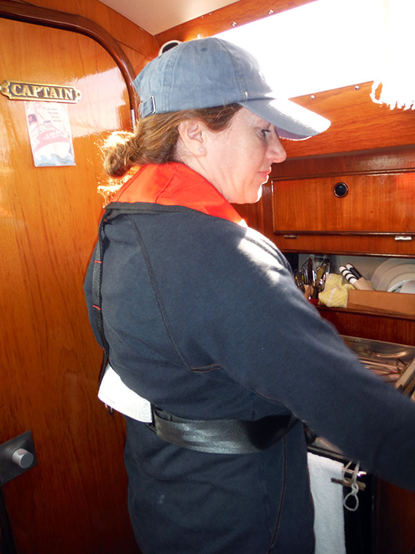 Heather preparing lunch in the galley