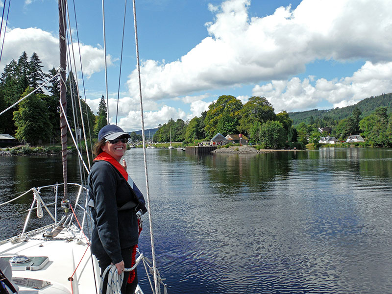 On the approach to Fort Augustus, Heather getting the docking lines ready