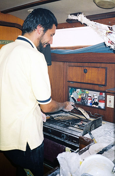 Lukasz giving the roti a "lick with the flame"