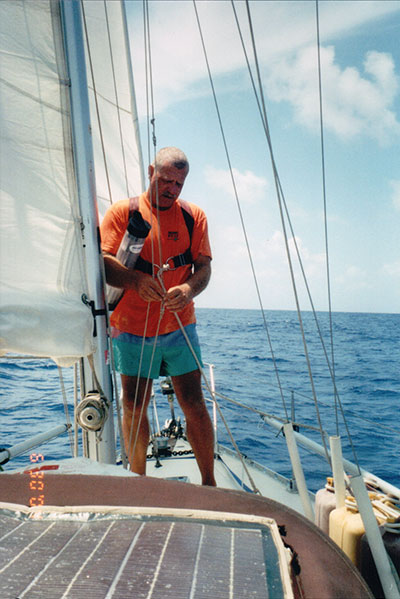 Rigging a new radar reflector while underway.